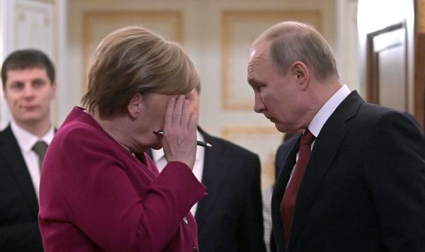 Президент РФ Владимир Путин и федеральный канцлер Германии Ангела Меркель перед совместной пресс-конференцией по итогам встречи, 11 января 2020