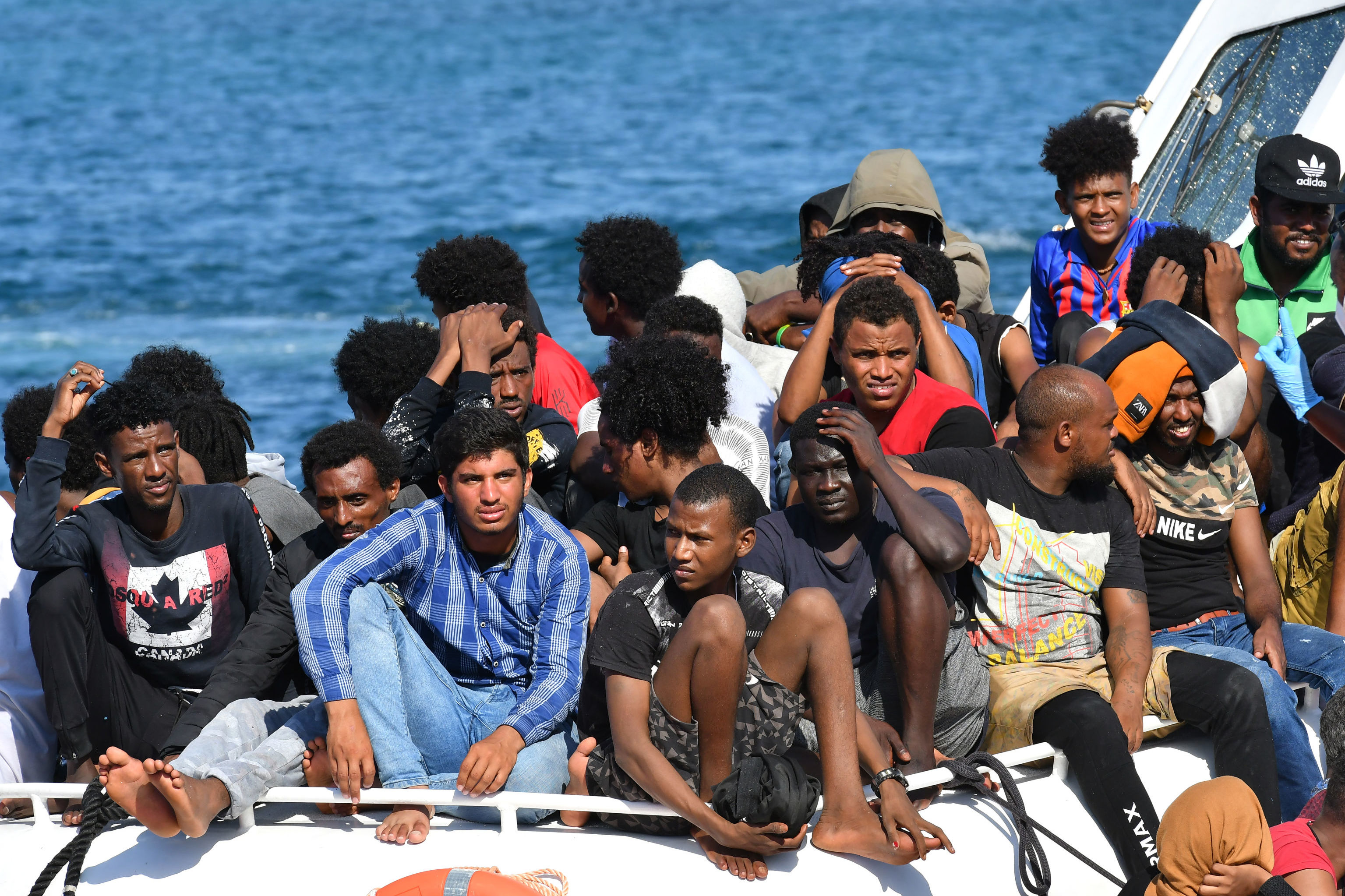 Мигранты из Туниса и Ливии
