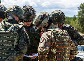 Солдаты НАТО из Италии, Испании, Польши и Канады на военной базе Адажи в Латвии