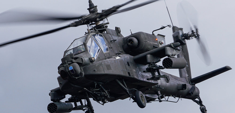 Вертолет AH-64 Apache на международных военных учениях "Summer Shield XIV" в Латвии.